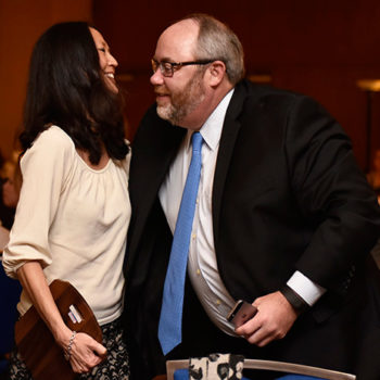 Merrily Cassidy is congratulated by her boss at the Cape Cod Times of Hyannis, Mass., executive editor Paul Pronovost, after she received the New England Newspaper and Press Association’s Daily Photojournalist of the Year award at NENPA’s winter convention.
Bulletin photo by Katy Rogers