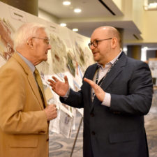 Keynote speaker Jason Rezaian of the Washington Post talks with Phillip Cabot Camp of the Vermont Standard at the New England Newspaper and Press Association’s annual meeting, 2019.